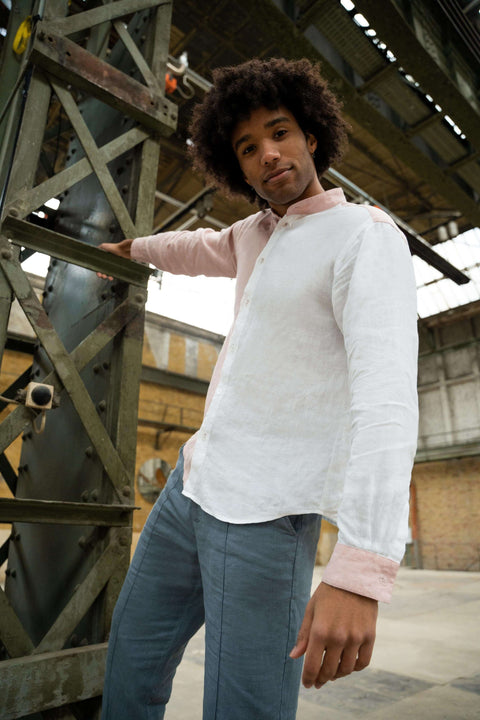 model adam wearing linen dual shirt in light pink from HACOY