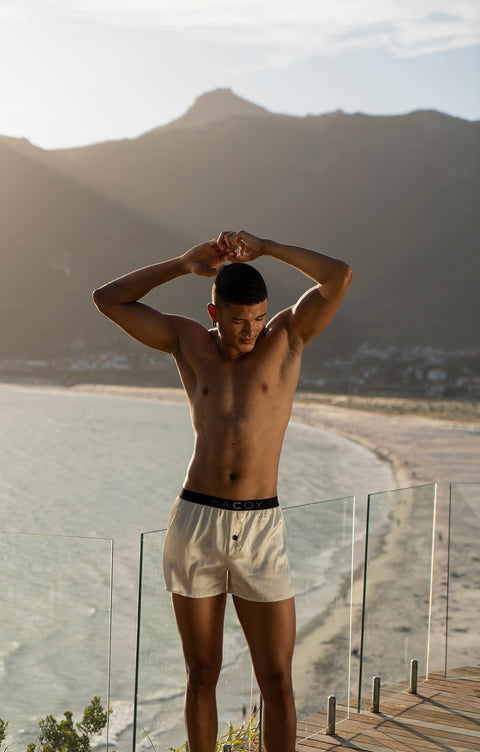 male model wearing sustainable silk boxer shorts from HACOY